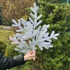 Декоративна гілка штучної хвої Traditional 60 см засніжена Декоративна гілка штучної хвої Traditional 60 см засніжена