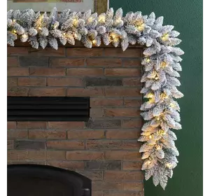 Гірлянда хвойна Elegant з плівки 1.5 м засніжена Гірлянда хвойна Elegant з плівки 1.5 м засніжена